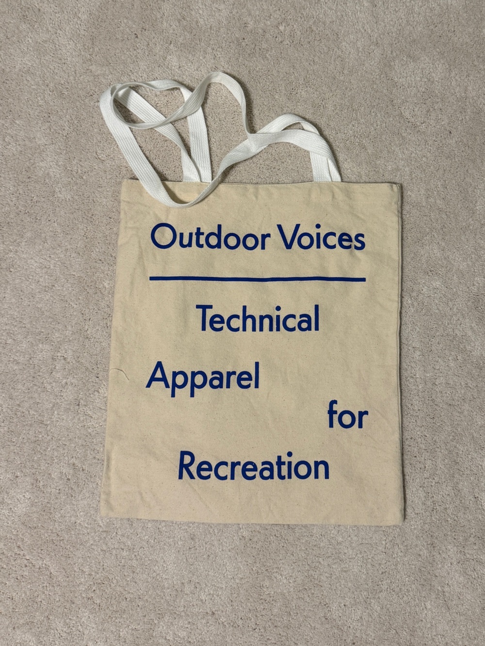 Outdoor Voices Cream Canvas Tote with Blue Logo Text
